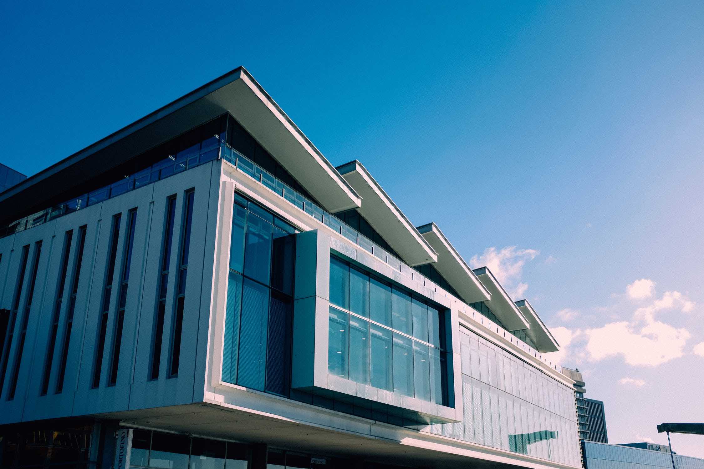 A commercial building against the blue sky